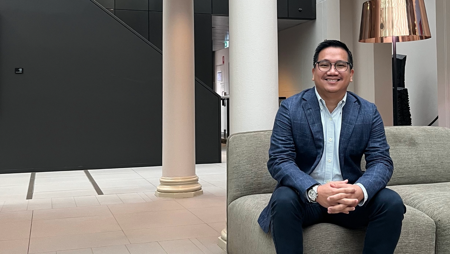 Jude Mazon in Sydney office, seated