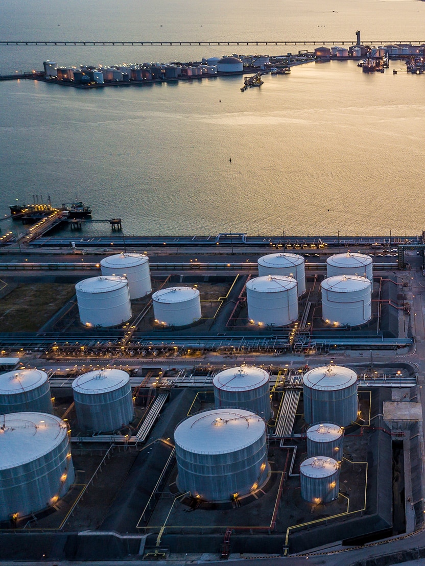Aerial view white oil tank, storage of oil and petrochemical products ready for logistic and transport business