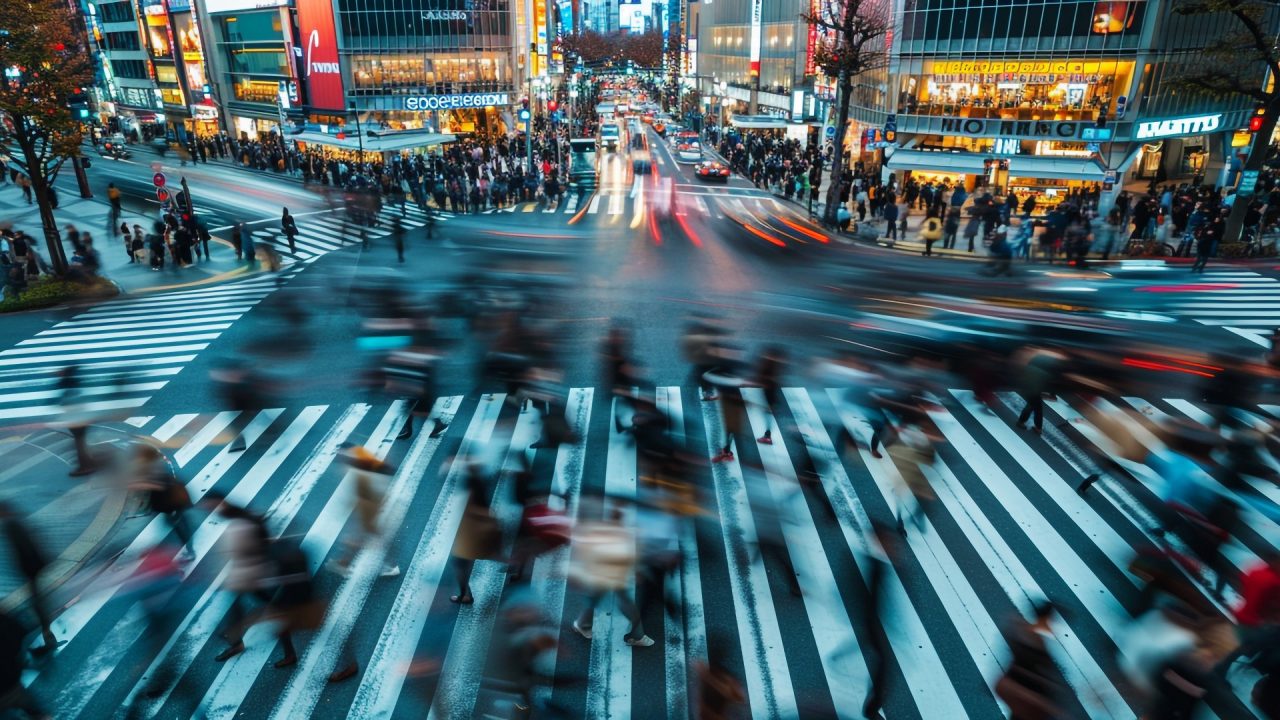 Aerial view of busy city with people and traffic