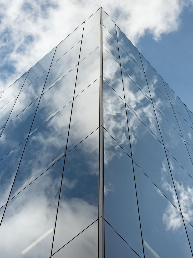 Low angle of tall corporate glass building. Southwark, London
