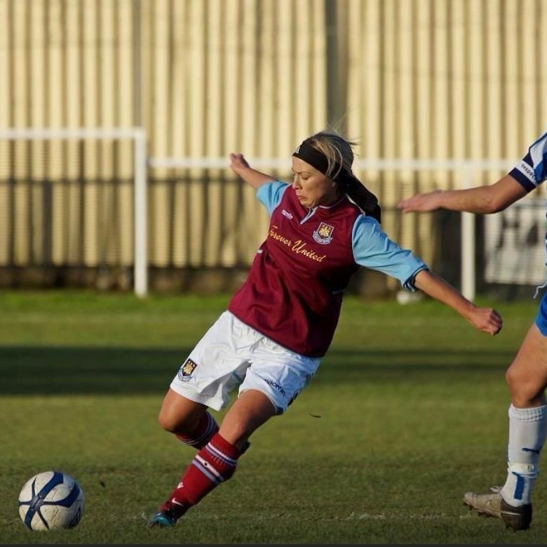 Victoria King playing football for West Ham United