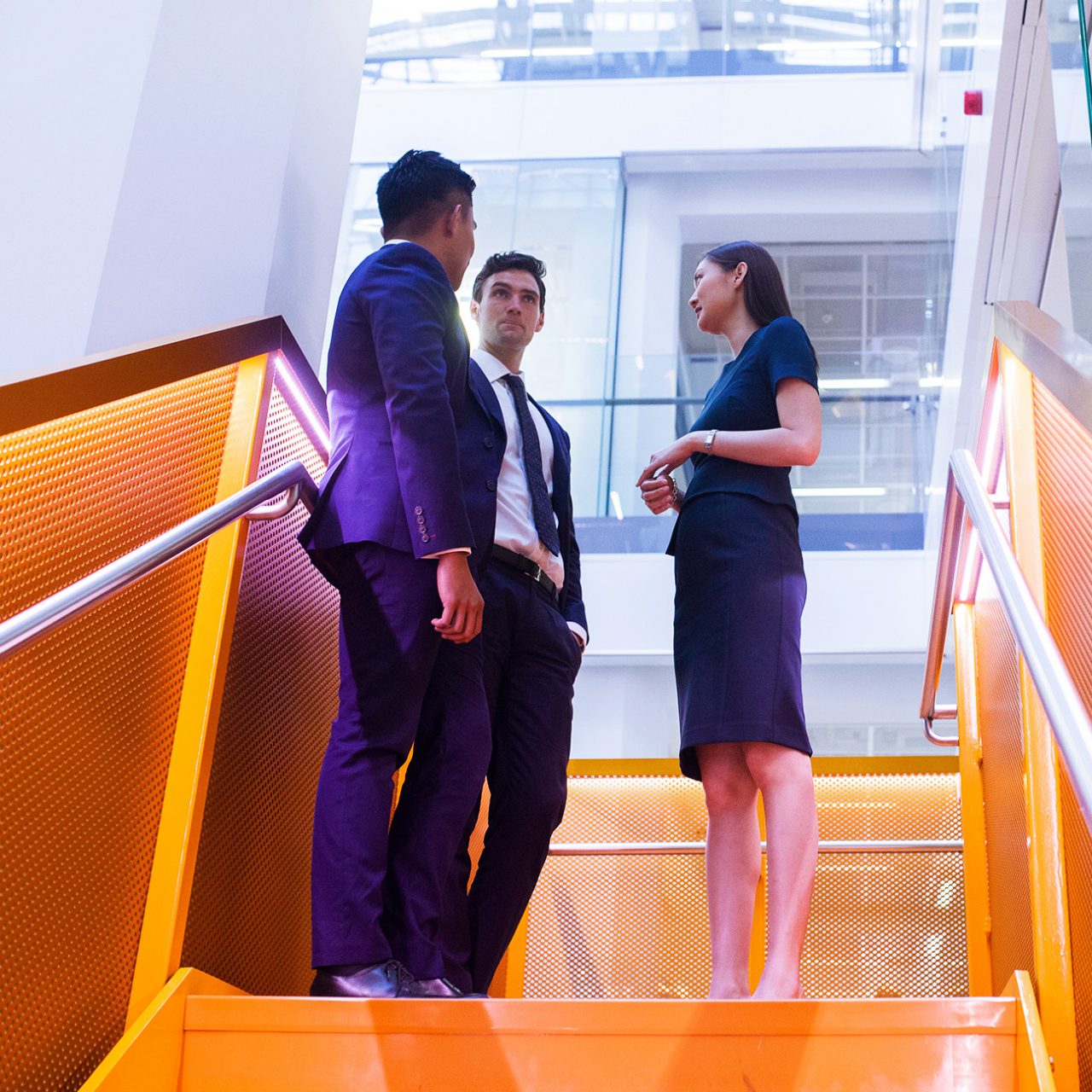People meeting on the stairs at 50 Martin Place, Sydney office