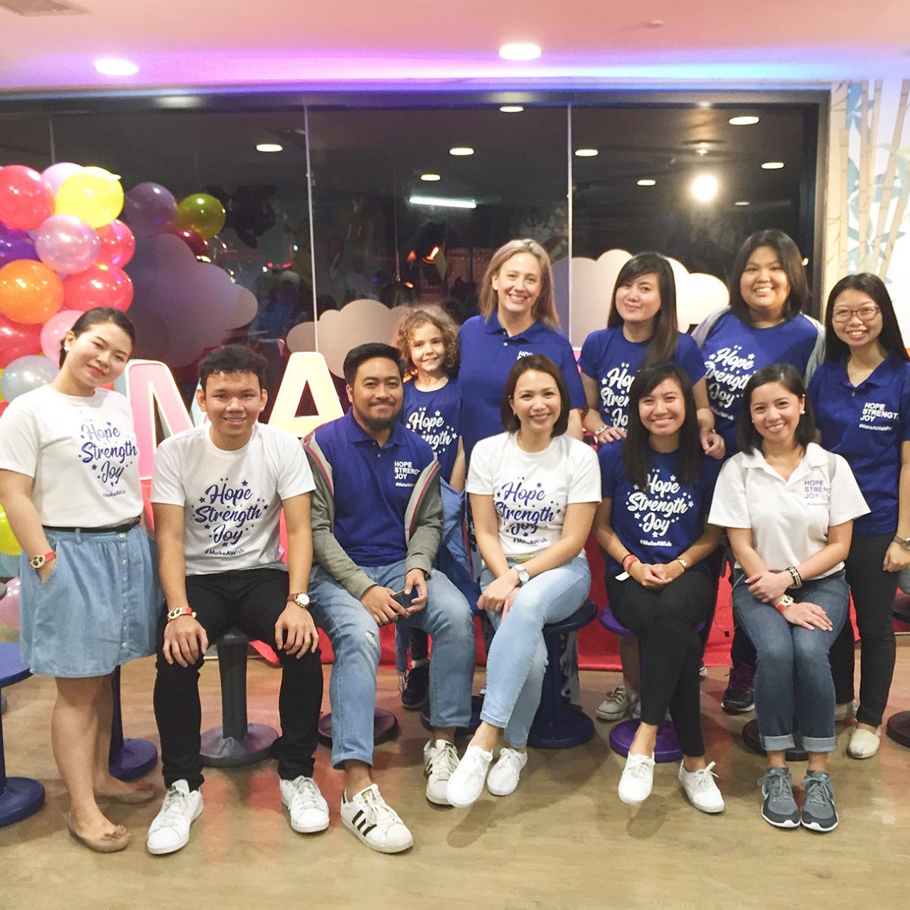 Staff in Manila sold t-shirts to raise money for the children’s charity Make a Wish Foundation