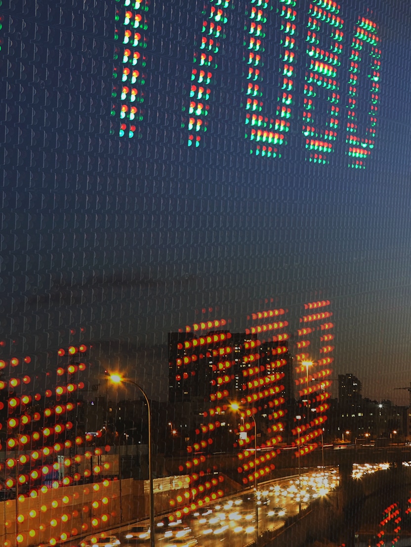 Screen numbers with city reflection