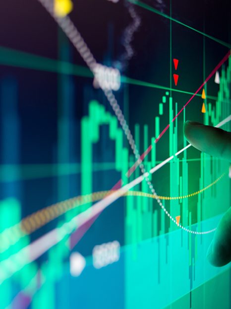 Finger pointing at graph