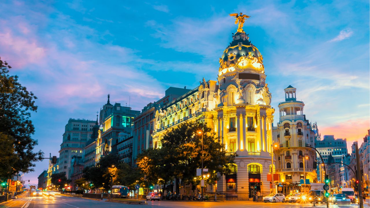 Madrid city skyline gran via street twilight , Spain