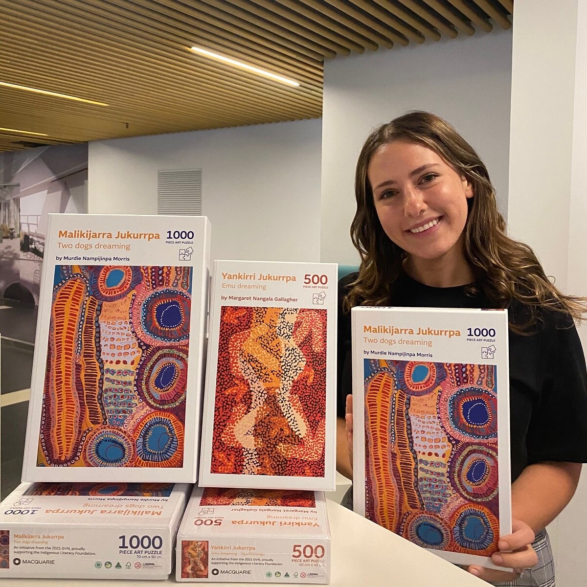 Zoe with limited edition Indigenous art puzzles