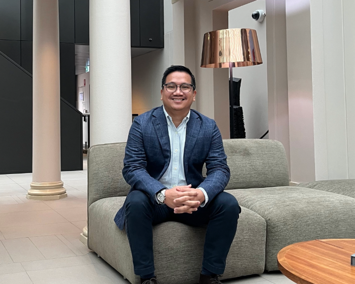 Jude Mazon in Sydney office, seated