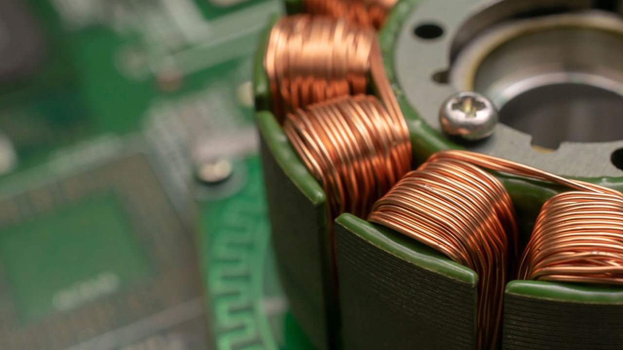 Close up of a motor rotor and copper stator windings