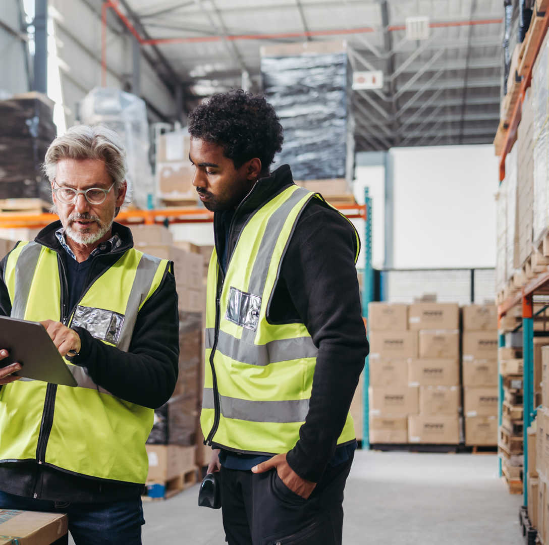 men looking at tablet image