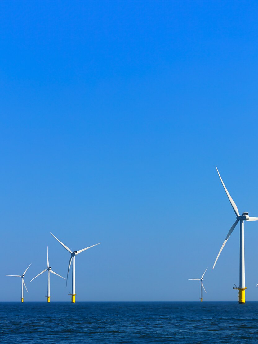 view of windmills of Rampion windfarm off the coast of Brighton, Sussex, UK