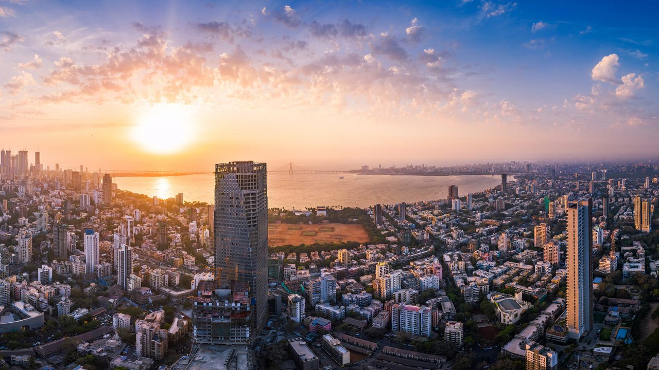 The Bandra Worli Sea Link is seen passing over the Mahim Bay, with the city around it. Dadar, Prabhadevi, Lower Parel, Worli, Matunga, Mahim and Bandra can be seen.