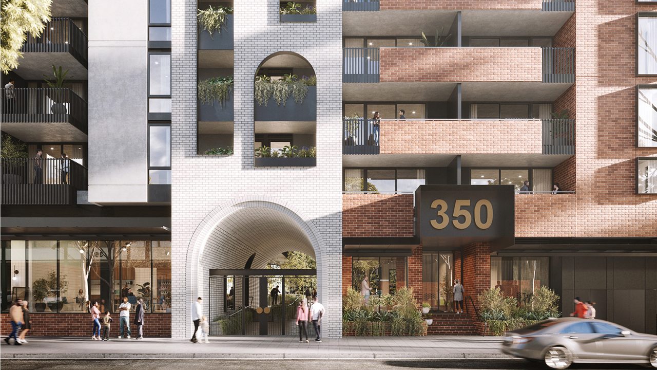 multi-storey apartment building with street number 350 and pedestrians and residents