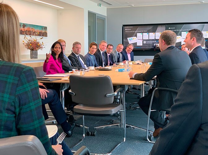 Shemara Wikramanayake, Managing Director and CEO of Macquarie Group sitting at a table with wind leaders from Scotland 