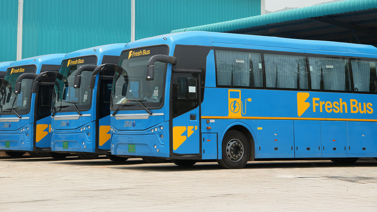 four buses parked in a row