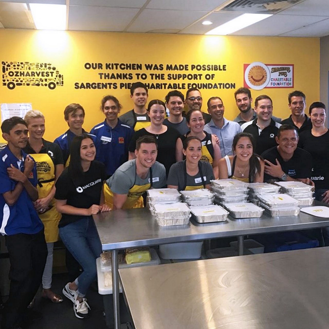 Brisbane staff volunteered with the Clontarf Foundation and OzHarvest, preparing food for the homeless