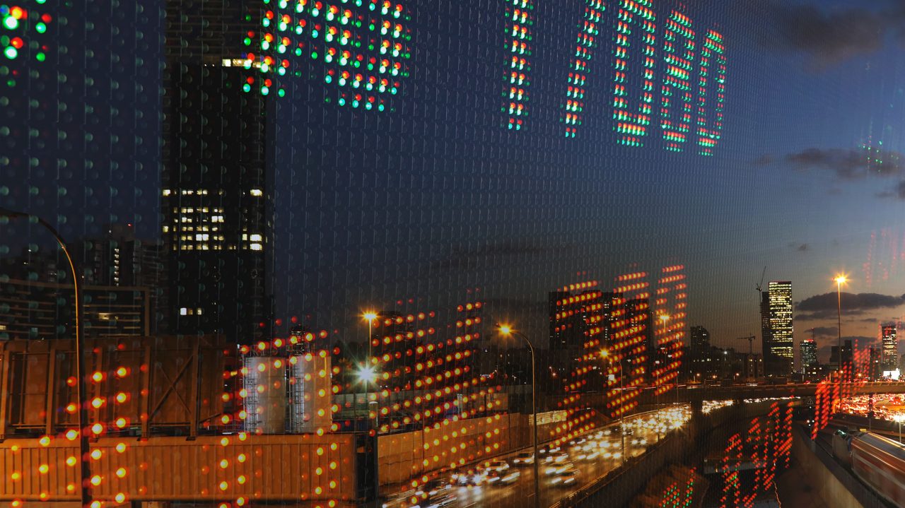Screen numbers with city reflection