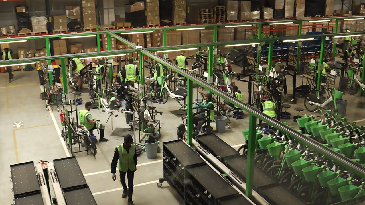 Program participants gaining hands-on experience in the Lime bike warehouse.
