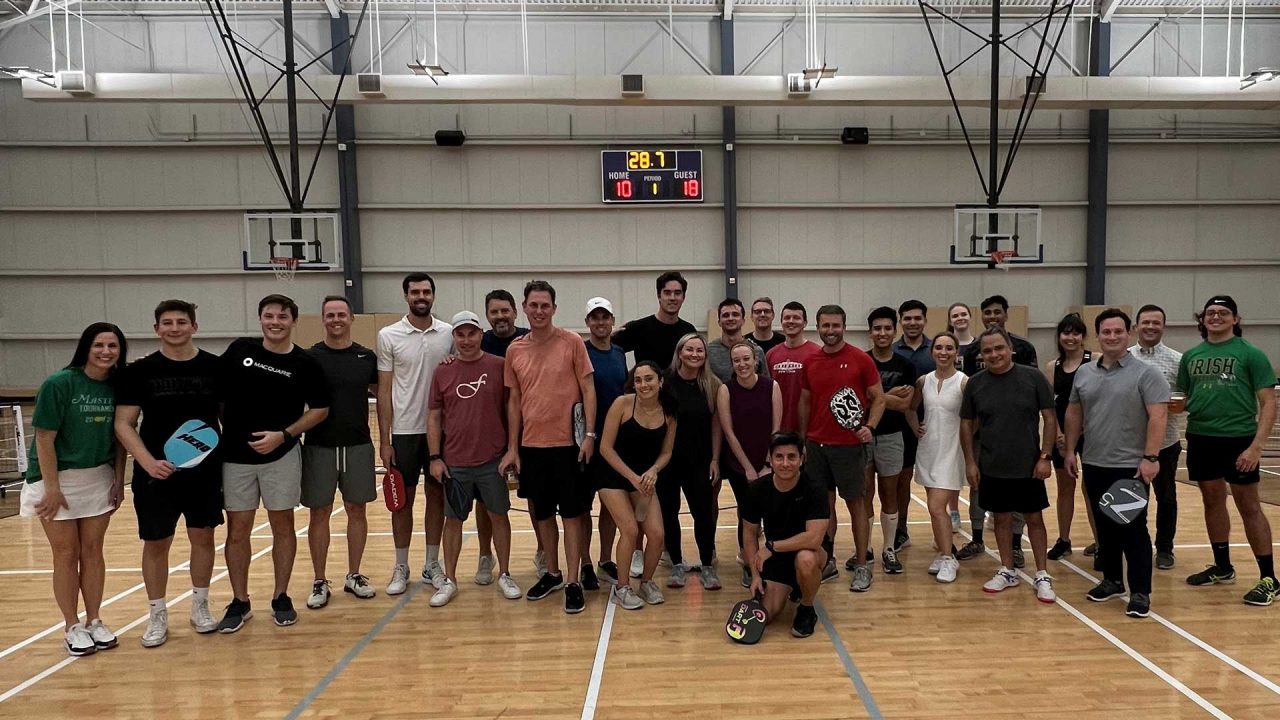 Vanessa Stacey (front row, centre) at the pickleball tournament fundraiser for AVDA.