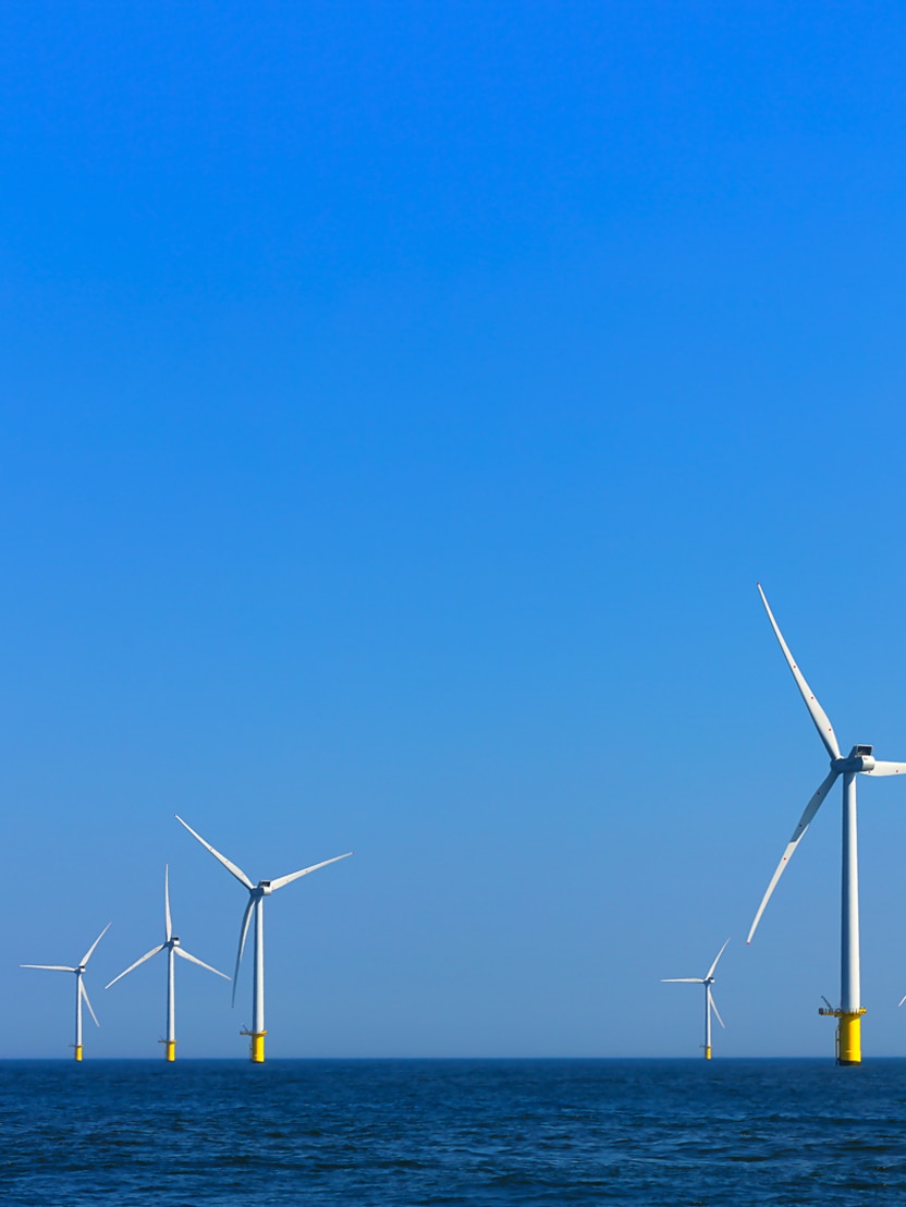 view of windmills of Rampion windfarm off the coast of Brighton, Sussex, UK