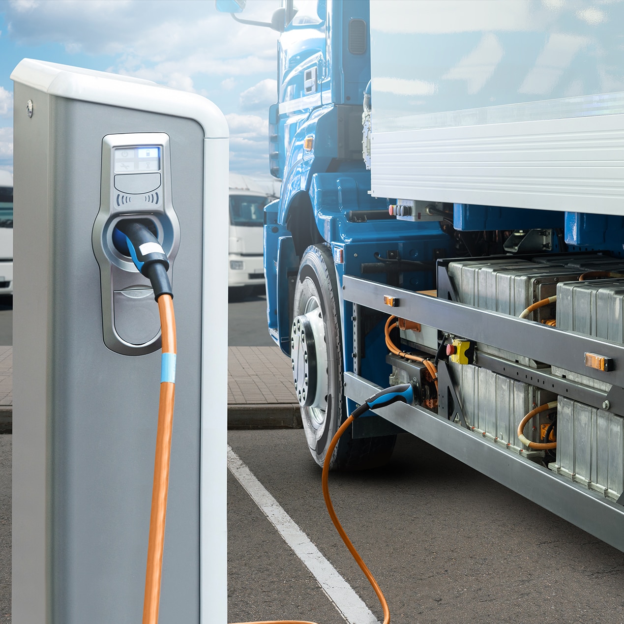 close up image of an electric HGV truck getting recharged 