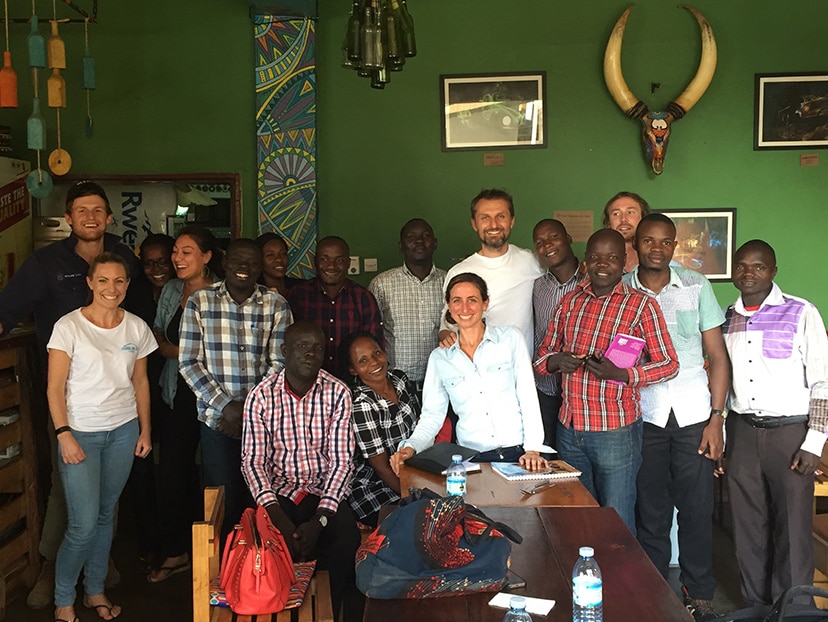 Artur Kaluza (sixth from right), Winner of Pro Bono Adviser of the Year, 2018 Macquarie Staff in the Community Awards, pictured with the School for Life team in Uganda