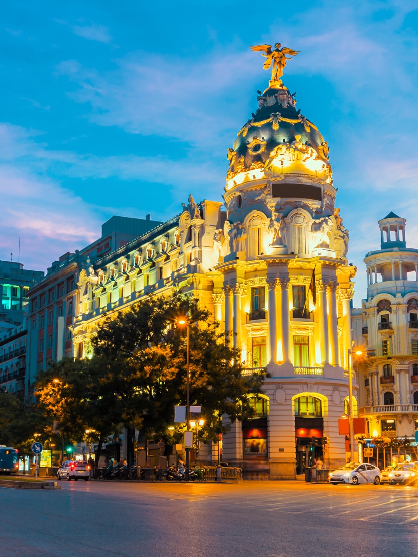 Madrid city skyline gran via street twilight , Spain