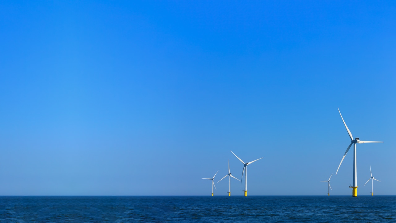 view of windmills of Rampion windfarm off the coast of Brighton, Sussex, UK