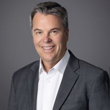 Headshot of Greg Allen