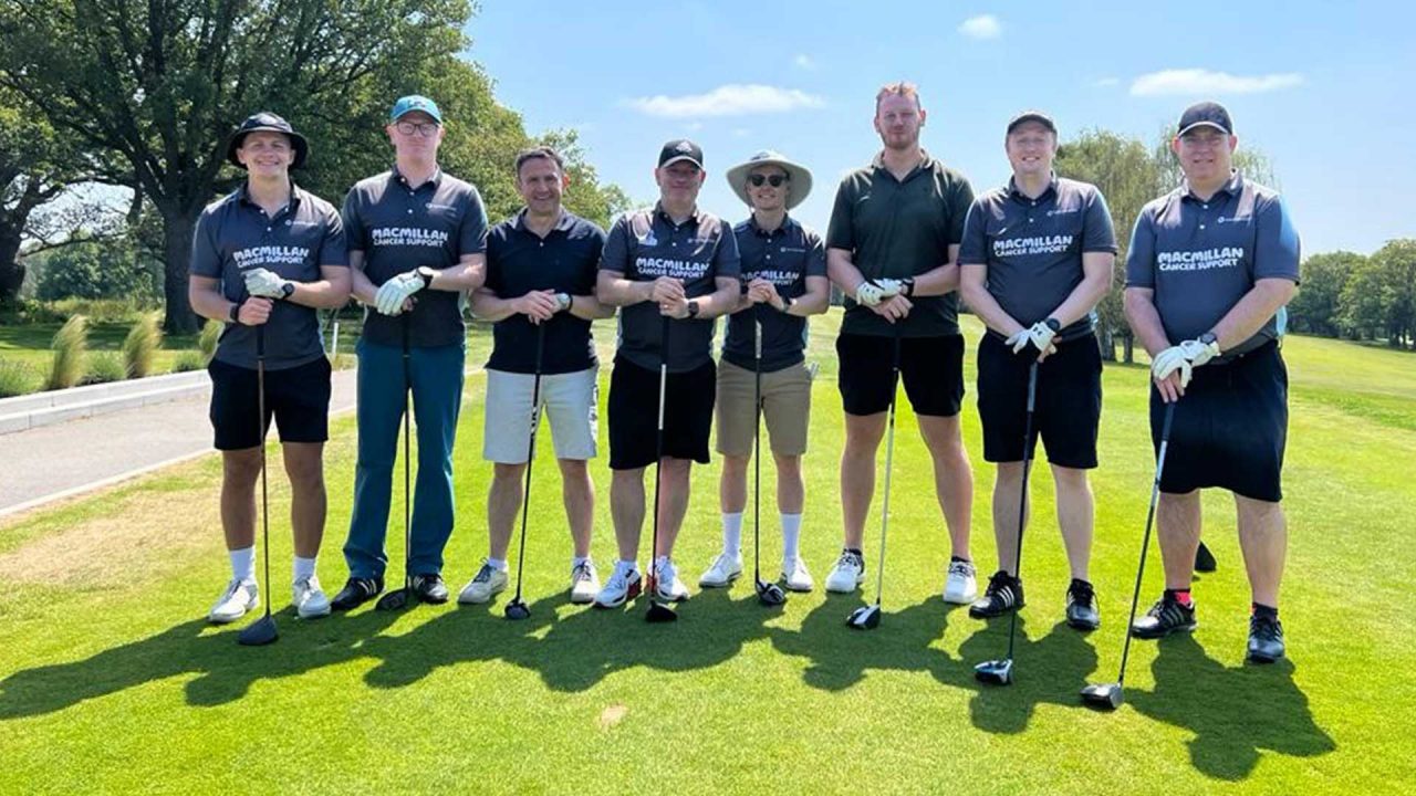 Scott Learoyd (fourth from left) at the Longest Day golf challenge, raising funds for MacMillan Cancer Support.
