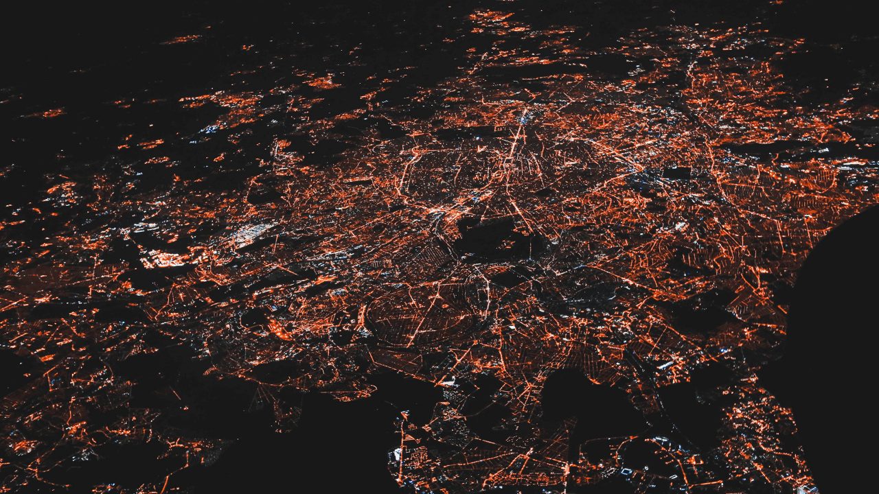 aerial of city at night