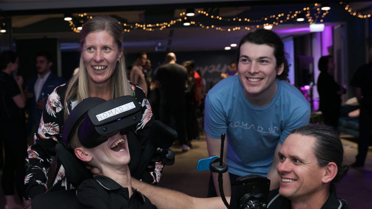 Man enjoying his experience using the Nomad virtual reality headset.